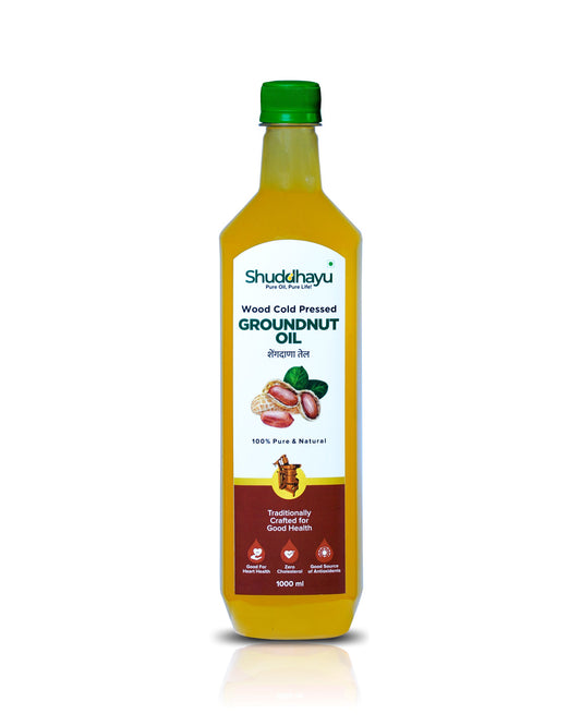 Bottle of Shuddhayu groundnut oil on a white background