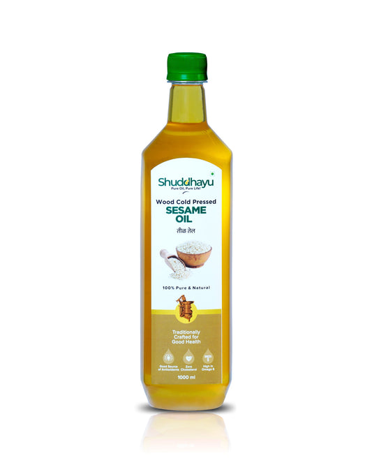 Bottle of Shuddhayu Sesame Oil on a white background