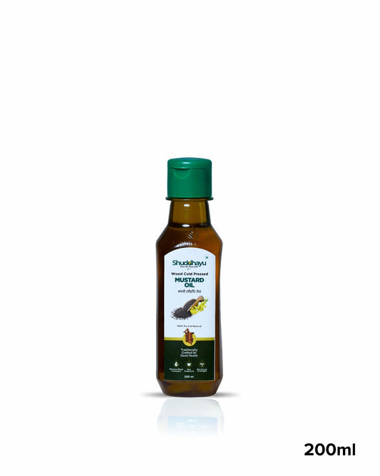 Bottle of Shuddhayu mustard oil with a green cap on a white background