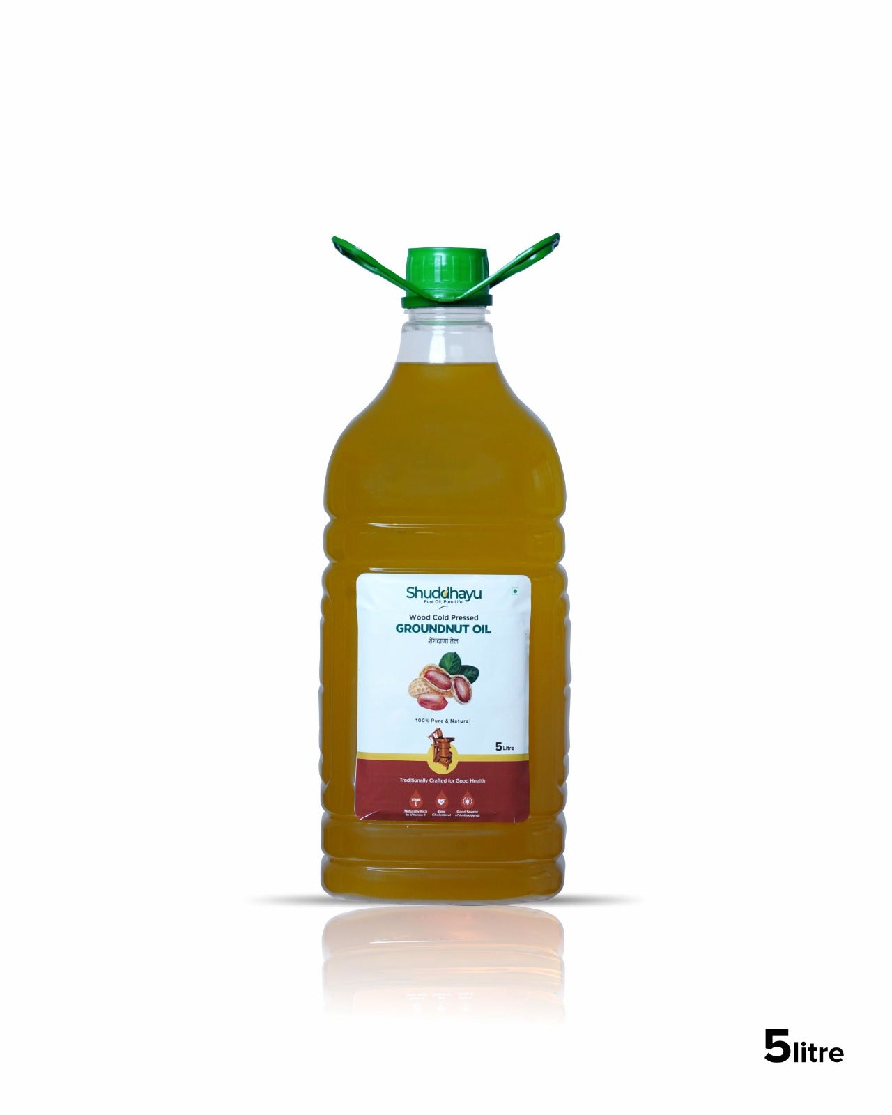 Bottle of Shuddhayu Groundnut Oil with a green cap on a white background